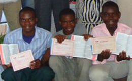 Children in Mozambique enjoy getting their first Bibles and learning about the Lord.